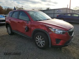 2015 Mazda CX-5 Sport with VIN JM3KE4BE7F0449623, listed as a Copart auction lot 78989944 with 154,156 mi miles and Salvage title. Bid and sale history available at DreamBid. Image 4.