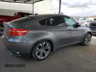2012 BMW X6 50i z VIN 5UXFG8C53CL590742, wystawiony jako Copart lot #52072205 z przebiegiem 98 177 mil mil oraz Tytuł czysty. Historia ofert i sprzedaży dostępna na DreamBid. Obrazek 3.