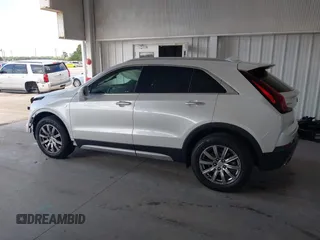2019 Cadillac XT4 FWD Premium Luxury z VIN 1GYFZCR49KF142039, wystawiony jako IAAI lot #42259448 z przebiegiem 47 620 mil mil oraz . Historia ofert i sprzedaży dostępna na DreamBid. Obrazek 15.