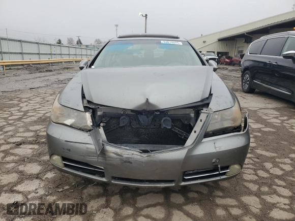2010 Acura RL Technology z VIN JH4KB2F61AC000517, wystawiony jako Copart lot #43814445 z przebiegiem 197 918 mil mil oraz Szkoda całkowita • Salvage title. Historia ofert i sprzedaży dostępna na DreamBid. Obrazek 5.