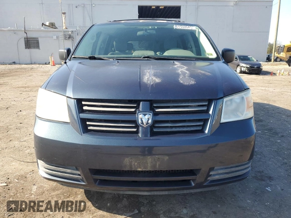 2009 Dodge Grand Caravan SE z VIN 1D8HN44E09B512488, wystawiony jako Copart lot #51506045 z przebiegiem 111 604 mil mil oraz Szkoda całkowita • Salvage title. Historia ofert i sprzedaży dostępna na DreamBid. Obrazek 5.