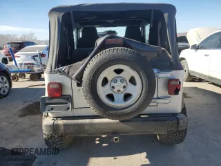 2003 Jeep Wrangler X with VIN 1J4FA39S63P304582, listed as a Copart auction lot 83576014 with 139,002 mi miles and Salvage Title. Bid and sale history available at carsss.com. Image 6.