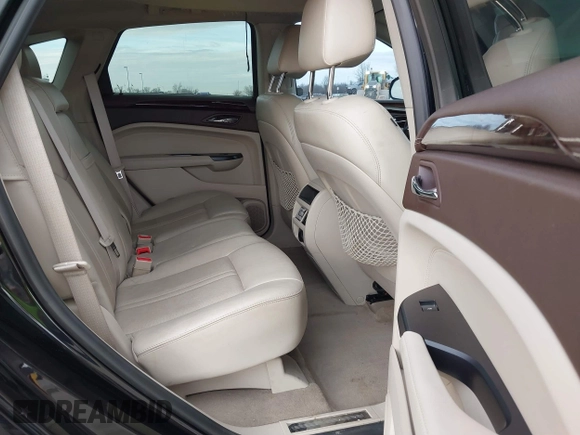 2013 Cadillac SRX Performance Collection with VIN 3GYFNHE34DS595277, listed as a IAAI auction lot 41618126 with 118,141 mi miles. Bid and sale history available at carsss.com. Image 8.