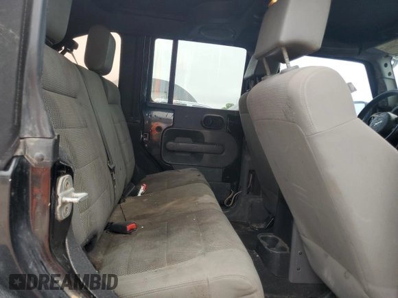 2007 Jeep Wrangler Unlimited Rubicon with VIN 1J4GA69117L112867, listed as a Copart auction lot 59909565 with 166,963 mi miles and Salvage title. Bid and sale history available at DreamBid. Image 11.