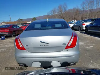 2014 Jaguar XJ z VIN SAJWJ1CD0E8V63989, wystawiony jako IAAI lot #41643513 z przebiegiem 119 924 mil mil oraz . Historia ofert i sprzedaży dostępna na DreamBid. Obrazek 16.