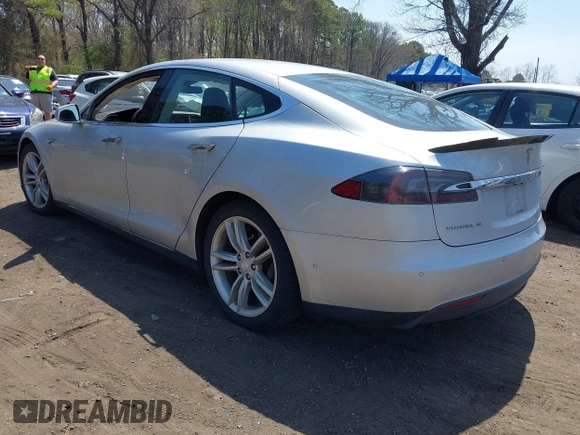 2015 Tesla Model S 85D with VIN 5YJSA1H2XFF084145, listed as a IAAI auction lot 42101755 with 105,660 mi miles. Bid and sale history available at carsss.com. Image 3.