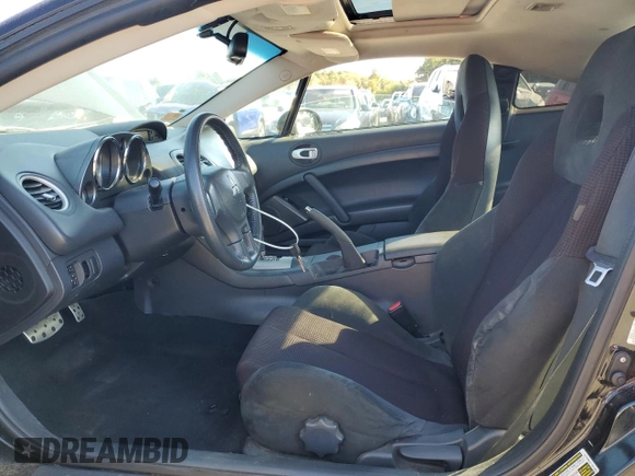2009 Mitsubishi Eclipse GS with VIN 4A3AK24FX9E039359, listed as a Copart auction lot 76635904 with 66,228 mi miles and Salvage Title. Bid and sale history available at carsss.com. Image 7.