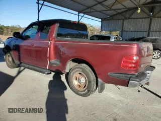2003 Ford F-150 XL with VIN 1FTRX07L33KB73992, listed as a Copart auction lot 79565774 with 160,545 mi miles and Salvage title. Bid and sale history available at DreamBid. Image 2.
