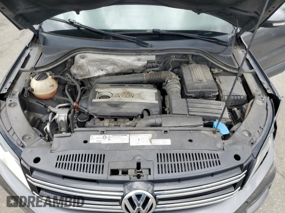2012 Volkswagen Tiguan LE with VIN WVGAV7AXXCW005049, listed as a Copart auction lot 57818925 with 137,850 mi miles and Salvage title. Bid and sale history available at DreamBid. Image 12.