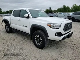 2019 Toyota Tacoma SR z VIN 3TMCZ5AN1KM190613, wystawiony jako Copart lot #57983795 z przebiegiem 41 627 mil mil oraz Szkoda całkowita • Salvage title. Historia ofert i sprzedaży dostępna na DreamBid. Obrazek 13.