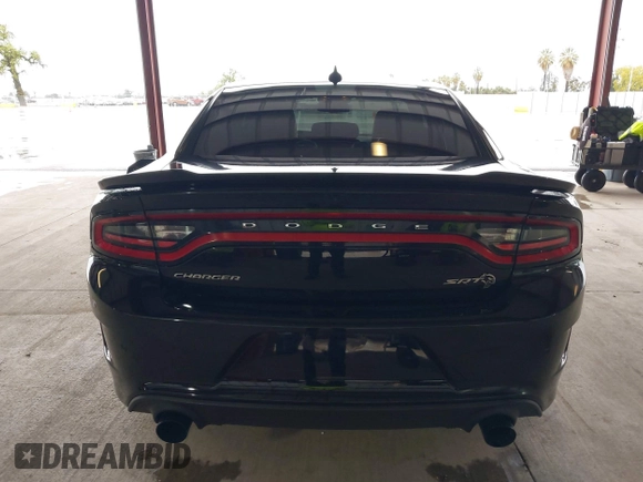 2019 Dodge Charger SRT Hellcat with VIN 2C3CDXL97KH552439, listed as a IAAI auction lot 41813879 with 58,921 mi miles and . Bid and sale history available at DreamBid. Image 16.