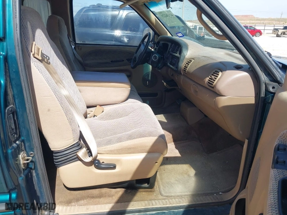 1999 Dodge Ram 1500 with VIN 3B7HC13Y0XG169104, listed as a IAAI auction lot 41936221 with 183,546 mi miles. Bid and sale history available at carsss.com. Image 5.