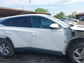 2022 Hyundai Tucson SE z VIN 5NMJACAE3NH012650, wystawiony jako IAAI lot #42137835 z przebiegiem 107 599 mil mil oraz . Historia ofert i sprzedaży dostępna na DreamBid. Obrazek 14.