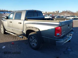2006 Dodge Dakota SLT with VIN 1D7HW48K56S699157, listed as a IAAI auction lot 41333140 with 273,055 mi miles. Bid and sale history available at carsss.com. Image 3.