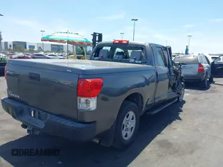 2013 Toyota Tundra z VIN 5TFRM5F15DX053654, wystawiony jako IAAI lot #42324593 z przebiegiem 128 206 mil mil oraz . Historia ofert i sprzedaży dostępna na DreamBid. Obrazek 4.