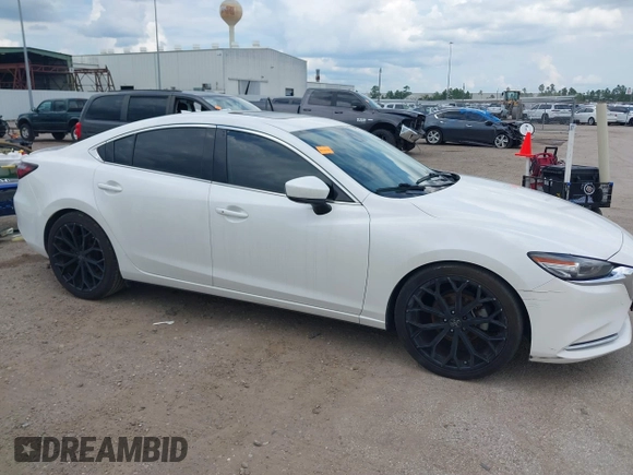 2018 Mazda 6 Grand Touring Reserve with VIN JM1GL1WY1J1321517, listed as a IAAI auction lot 39411226 with 50,280 mi miles and . Bid and sale history available at DreamBid. Image 13.