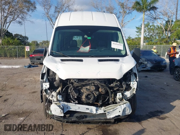2021 Ford Transit Cargo with VIN 1FTBR1X87MKA50288, listed as a IAAI auction lot 41432535 with 96,934 mi miles and . Bid and sale history available at DreamBid. Image 12.