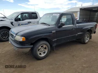 2000 Mazda B-Series Truck SX with VIN 4F4YR12C0YTM03810, listed as a Copart auction lot 70212584 with 169,361 mi miles and Salvage Title. Bid and sale history available at DreamBid. Image 1.