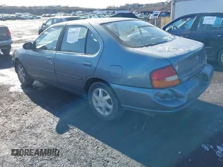 1999 Nissan Altima XE with VIN 1N4DL01D3XC273197, listed as a IAAI auction lot 41508232 with 168,658 mi miles. Bid and sale history available at carsss.com. Image 3.