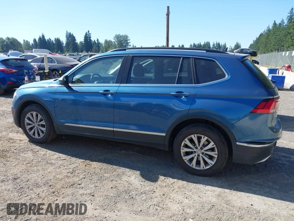 2018 Volkswagen Tiguan SEL z VIN 3VV2B7AX0JM084232, wystawiony jako IAAI lot #42726306 z przebiegiem 97 624 mil mil oraz . Historia ofert i sprzedaży dostępna na DreamBid. Obrazek 14.