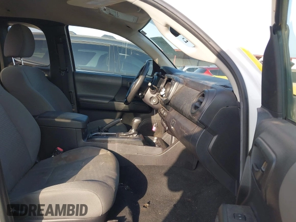 2022 Toyota Tacoma SR with VIN 3TYRX5GNXNT038474, listed as a IAAI auction lot 42090753 with 142,590 mi miles and . Bid and sale history available at DreamBid. Image 5.