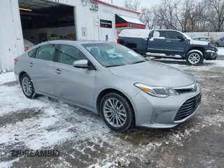 2016 Toyota Avalon Hybrid XLE Premium with VIN 4T1BD1EBXGU051548, listed as a IAAI auction lot 41353975 with 30,102 mi miles. Bid and sale history available at carsss.com. Image 1.