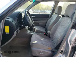 2005 Subaru Forester XS с VIN JF1SG65665H733429, выставлен на аукционе Copart как лот 52937625 с пробегом 157 613 миль миль и Списание • Salvage title. История ставок и продаж доступна на DreamBid. Изображение 7.
