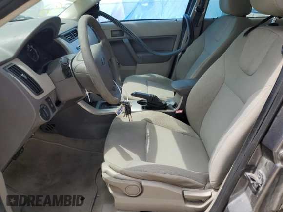 2009 Ford Focus S with VIN 1FAHP34N79W178011, listed as a Copart auction lot 51120195 with 123,930 mi miles and Salvage Title. Bid and sale history available at carsss.com. Image 7.
