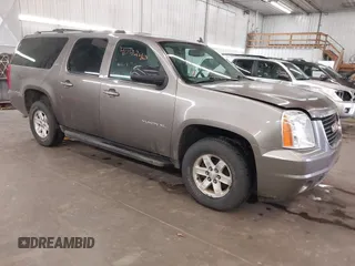 2013 GMC Yukon XL SLT with VIN 1GKS2KE71DR213758, listed as a IAAI auction lot 41713240 with 193,611 mi miles. Bid and sale history available at carsss.com. Image 1.