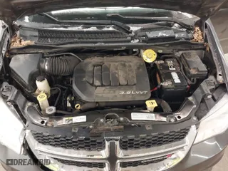 2014 Dodge Grand Caravan SE with VIN 2C4RDGBG5ER226594, listed as a IAAI auction lot 41199674 with 229,746 mi miles. Bid and sale history available at carsss.com. Image 10.