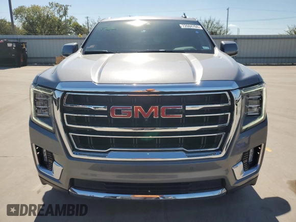 2021 GMC Yukon SLT with VIN 1GKS1BKD0MR157857, listed as a Copart auction lot 72684764 with 25,169 mi miles and Salvage Title. Bid and sale history available at carsss.com. Image 5.