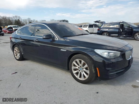 2014 BMW 5 Series Gran Turismo 550i xDrive with VIN WBA5M0C58ED084910, listed as a Copart auction lot 50920985 with 118,662 mi miles and Clean Title. Bid and sale history available at carsss.com. Image 4.