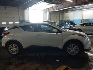 2019 Toyota C-HR XLE z VIN NMTKHMBX8KR087809, wystawiony jako IAAI lot #41540788 z przebiegiem 55 691 mil mil oraz . Historia ofert i sprzedaży dostępna na DreamBid. Obrazek 13.