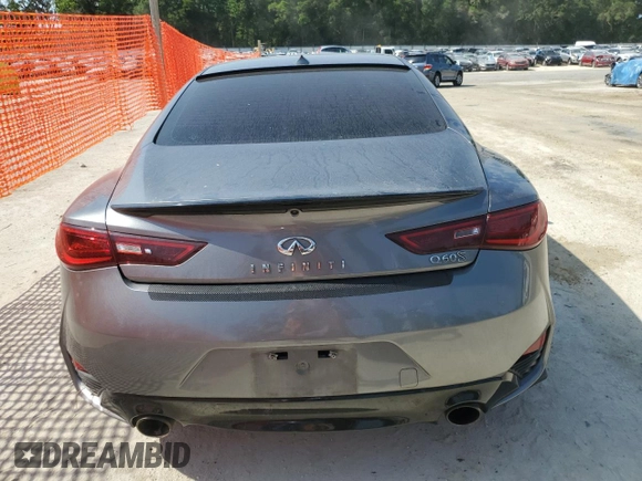 2018 Infiniti Q60 Luxe with VIN JN1EV7EKXJM340831, listed as a Copart auction lot 57178455 with 99,445 mi miles and Salvage title. Bid and sale history available at DreamBid. Image 6.