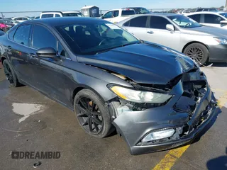 2018 Ford Fusion SE z VIN 3FA6P0H70JR191384, wystawiony jako IAAI lot #41340319 z przebiegiem 89 581 mil mil oraz . Historia ofert i sprzedaży dostępna na DreamBid. Obrazek 1.