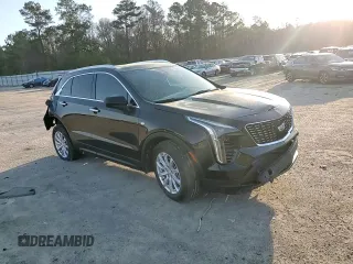 2023 Cadillac XT4 FWD Luxury with VIN 1GYAZAR49PF102307, listed as a Copart auction lot 49342465 with 21,093 mi miles and Salvage Title. Bid and sale history available at DreamBid. Image 12.