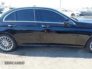 2021 Mercedes-Benz E-Class E 350 with VIN W1KZF8DB0MA889890, listed as a IAAI auction lot 41317094 with 63,075 mi miles. Bid and sale history available at carsss.com. Image 13.