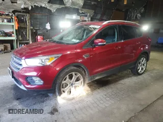 2019 Ford Escape Titanium with VIN 1FMCU9J94KUC17349, listed as a Copart auction lot 62154715 with 64,263 mi miles and Salvage title. Bid and sale history available at DreamBid. Image 1.