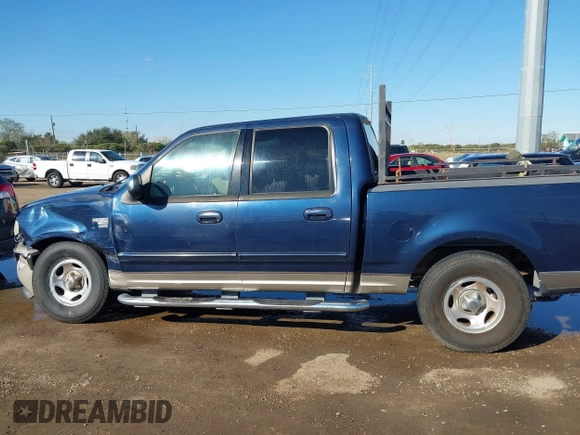 2002 Ford F-150 XLT with VIN 1FTRW07692KC25069, listed as a IAAI auction lot 41387047 with 208,811 mi miles. Bid and sale history available at carsss.com. Image 14.
