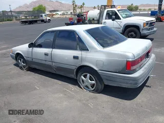 1988 Mazda 626 z VIN JM1GD2221J1550574, wystawiony jako IAAI lot #42415062 z przebiegiem 190 747 mil mil oraz . Historia ofert i sprzedaży dostępna na DreamBid. Obrazek 3.