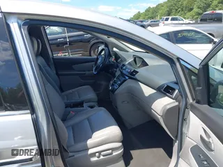 2012 Honda Odyssey Touring with VIN 5FNRL5H9XCB026741, listed as a IAAI auction lot 42808245 with 293,422 mi miles and . Bid and sale history available at DreamBid. Image 5.