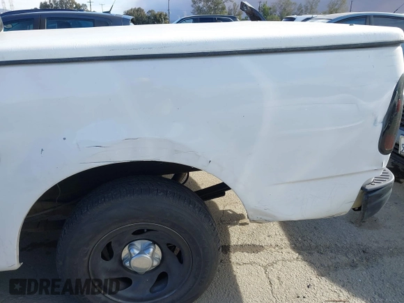 2000 Ford F-150 XL with VIN 1FTZX1727YKA78887, listed as a IAAI auction lot 41291272 with 289,343 mi miles. Bid and sale history available at carsss.com. Image 12.