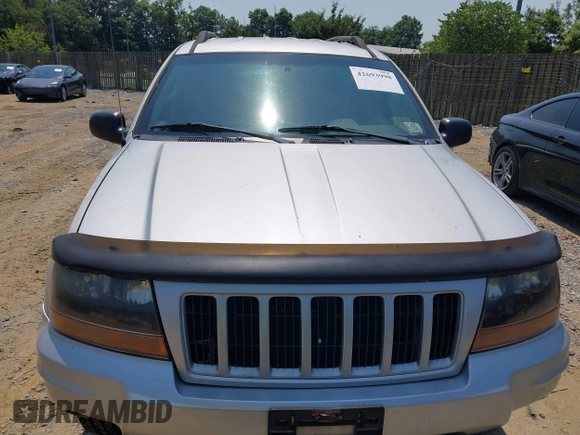 2004 Jeep Grand Cherokee Laredo with VIN 1J4GW48S94C369643, listed as a IAAI auction lot 42693998 with 225,033 mi miles and . Bid and sale history available at DreamBid. Image 6.