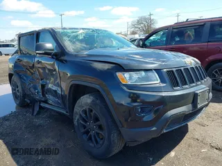 2014 Jeep Grand Cherokee Limited with VIN 1C4RJFBG7EC122572, listed as a IAAI auction lot 41937668 with 118,370 mi miles. Bid and sale history available at carsss.com. Image 1.