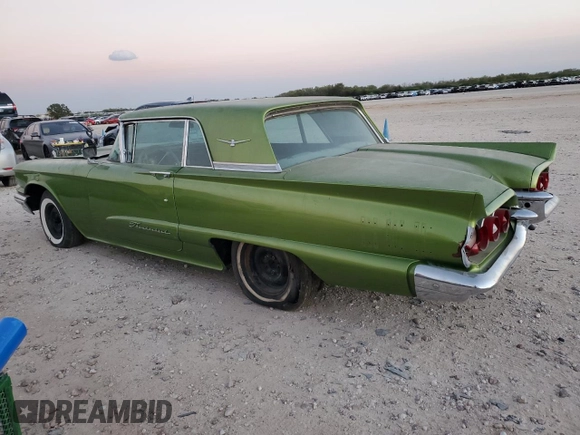 1960 Ford Thunderbird with VIN 0Y71Y166846, listed as a Copart auction lot 80034714 with 74,470 mi miles and Salvage Title. Bid and sale history available at DreamBid. Image 2.