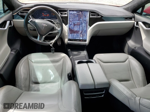 2016 Tesla Model S 90D with VIN 5YJSA1E42GF127593, listed as a Copart auction lot 52450495 with 144,151 mi miles and Salvage title. Bid and sale history available at DreamBid. Image 8.