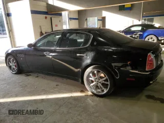 2005 Maserati Quattroporte z VIN ZAMCE39A050015127, wystawiony jako Copart lot #85957714 z przebiegiem 88 278 mil mil oraz Czysty tytuł • Clean title. Historia ofert i sprzedaży dostępna na DreamBid. Obrazek 2.