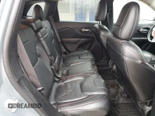 2014 Jeep Cherokee Trailhawk z VIN 1C4PJMBS1EW284275, wystawiony jako Copart lot #80191034 z przebiegiem 105 398 mil mil oraz Szkoda całkowita • Salvage title. Historia ofert i sprzedaży dostępna na DreamBid. Obrazek 11.