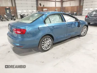 2015 Volkswagen Jetta SE z VIN 3VWD07AJ2FM315225, wystawiony jako IAAI lot #41929278 z przebiegiem 127 240 mil mil oraz . Historia ofert i sprzedaży dostępna na DreamBid. Obrazek 4.