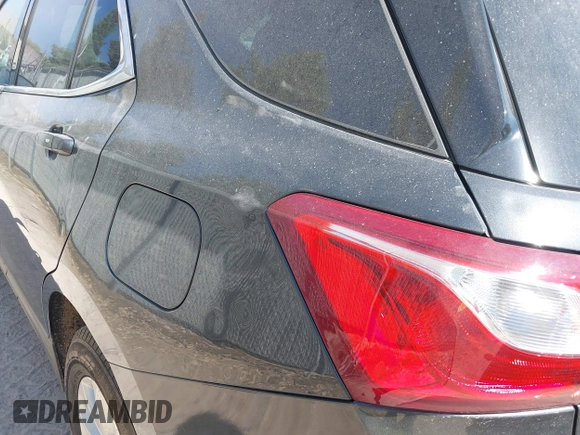 2018 Chevrolet Equinox LT z VIN 2GNAXSEV5J6207807, wystawiony jako IAAI lot #42224888 z przebiegiem 77 435 mil mil oraz . Historia ofert i sprzedaży dostępna na DreamBid. Obrazek 19.